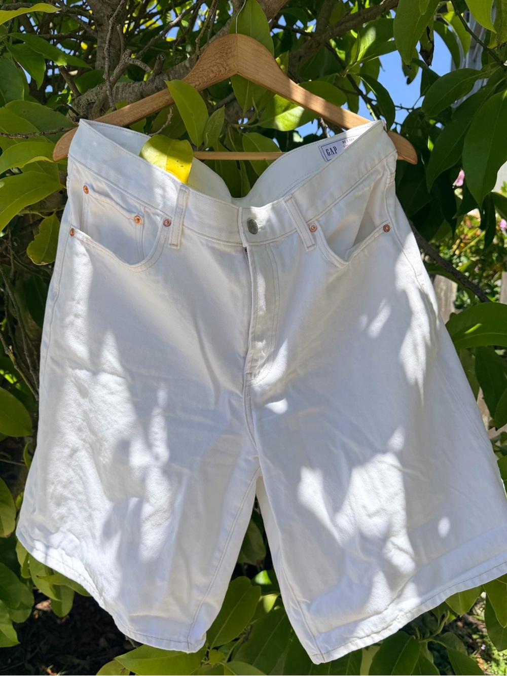 GAP women’s white denim longline shorts.